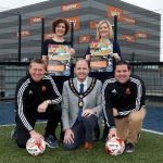 Emma McClimmonds and Briena McElwee, WorkRoutes NI (REED In Partnership); Coach Pat McGibbon; Lord Mayor Councillor Darryn Causby and Alex Clifford, Sports Development Officer launching the new KickBack programme in Craigavon, Lurgan and Portadown.