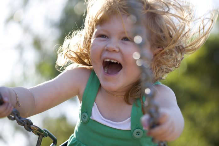 Little Girl Swinging