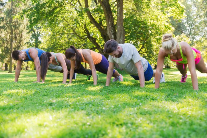 Boot camp Group exercise in park