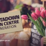 Market stall with pink tulip and jars