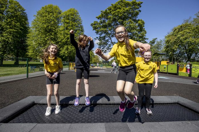 LURGAN PARK OPENING 9 four school girls play on new play park equipment