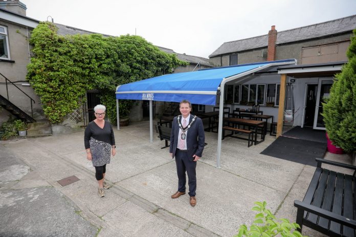 Alderman Glenn Barr pictured with Gail Redmond from Wings Café