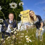 Pictured at Magheralin’s wildflower road verge this week, Lord Mayor of Armagh City, Banbridge and Craigavon, Councillor Paul Greenfield and ABC Council’s Natural Heritage Officer, Maeve Foley.