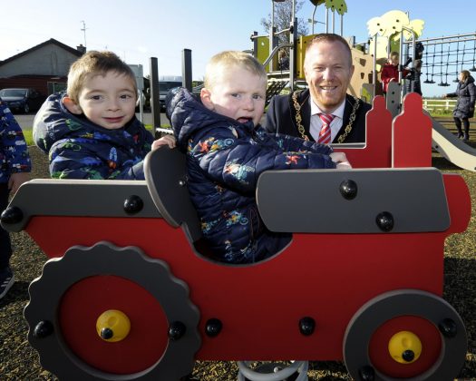 Lord Mayor of Armagh City, Banbridge and Craigavon, Councillor Paul Greenfield officially opens new play park at Millstone Close in Moneyslane, much to the delight of local children from the Nursery Unit at Drumadonnell PS.