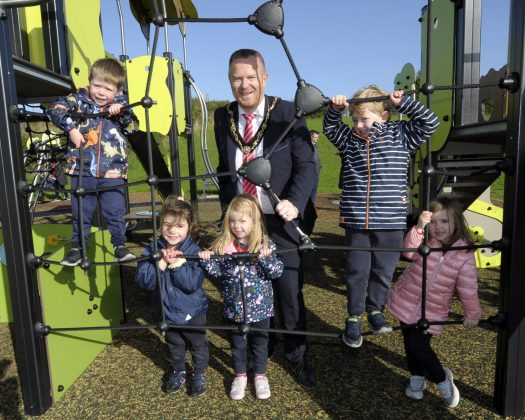 Lord Mayor of Armagh City, Banbridge and Craigavon, Councillor Paul Greenfield officially opens new play park at Millstone Close in Moneyslane, much to the delight of local children from the Nursery Unit at Drumadonnell PS.