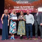 1. Pictured collecting the award, Vice Chair, Leisure & Community Services Committee, Councillor Declan McAlinden and Community Sports Development Officers, Clare Weir and Roisin O’Hagan with awards host Sian Lloyd and representative from category sponsor, Unison.