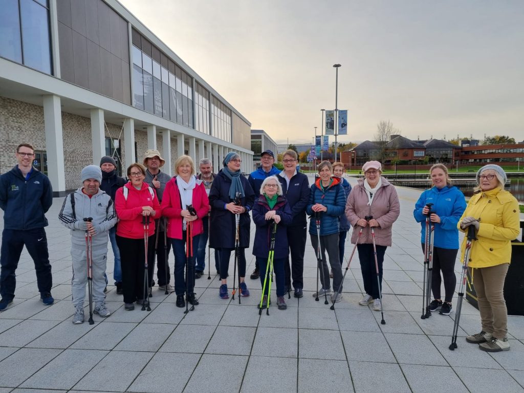 2.Ryan McQuillan, Active Recreation Officer, pictured with some of the GOGA…in Action participants before a Nordic Walking session.