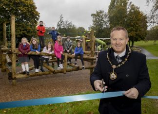 Lord Mayor of Armagh City, Banbridge and Craigavon, Councillor Paul Greenfield officially opens new play park in Scarva Park, much to the delight of local children from nearby Scarva Primary School.