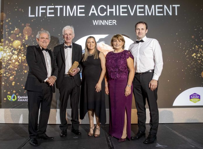 Dan O'Hare and family on stage to receive an award from the Farming Life Awards