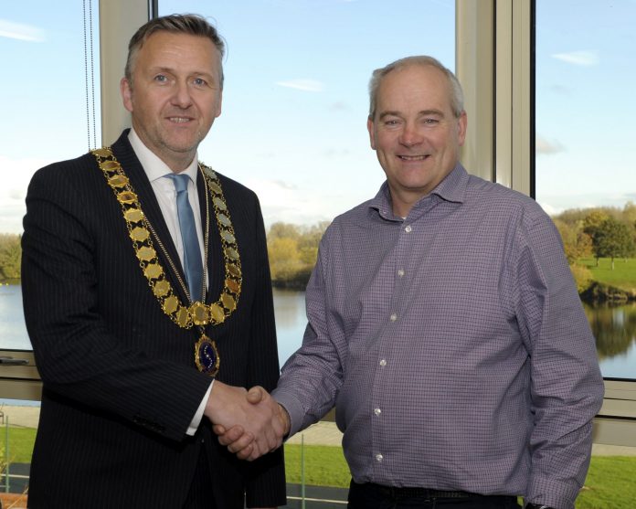 BC Councillor Sam Nicholson, ICBAN Chair for 2022/23 being congratulated by Councillor David Maxwell, Outgoing Chair ICBAN Chair