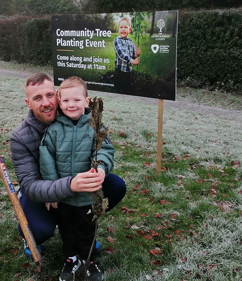 David Mayers and his son planting their tree at Edenvilla Park