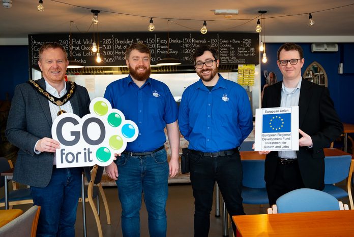 Pictured (left to right) Lord Mayor Councillor Paul Greenfield, Harry Singer, Co-owner of Roast and Roll, Aaron Bushby, Co-owner of Roast and Roll and Samuel Marshall, business advisor at the Banbridge Enterprise Centre.