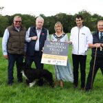 Lord Mayor of ABC Council standing in a field with organisers and sponsors of the World Sheepdog Trials
