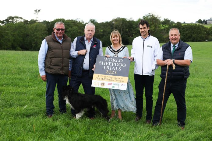 Lord Mayor of ABC Council standing in a field with organisers and sponsors of the World Sheepdog Trials