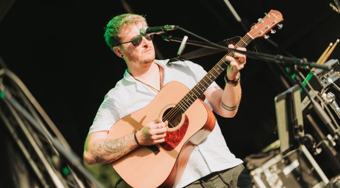 Man playing guitar on stage