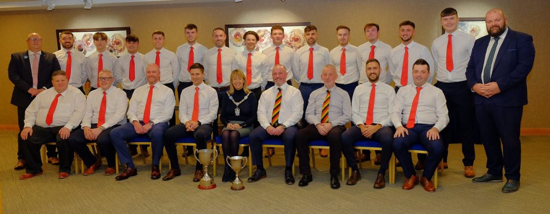 Large group of people at a civic reception.