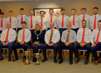 Large group of people at a civic reception.