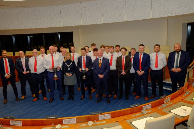 Large group of people at a civic reception.