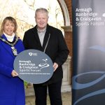 Lord Mayor Alderman Margaret Tinsley and Chair of ABC Sports Forum Cathal O'Neill are holding an ABC Sports Forum sign to encourage sports clubs and individuals to join the forum.