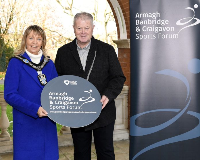 Lord Mayor Alderman Margaret Tinsley and Chair of ABC Sports Forum Cathal O'Neill are holding an ABC Sports Forum sign to encourage sports clubs and individuals to join the forum.