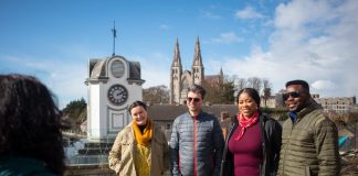 Four people undertaking a walking tour of Armagh