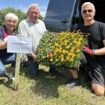 Harry and Normal from Magheralin Gardening Team pick up the flowers for their village from Leanne McShane (ABC Council).