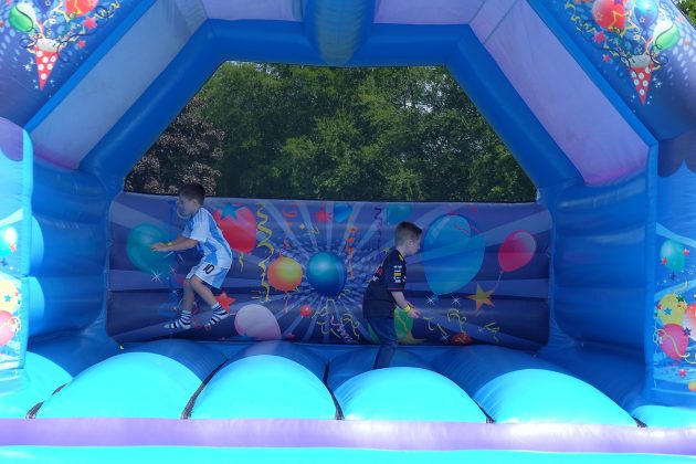 Children on bouncy castle