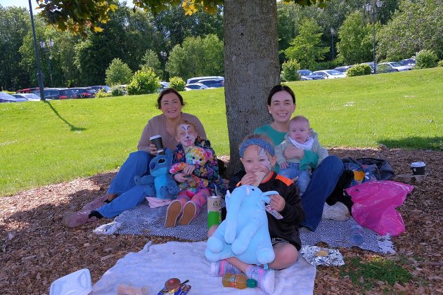 Family on picnic blanket