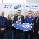 Council welcomes Walking for All launch to inspire health, inclusion and community 5 people holding a walking for all foot-shaped prop