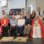 Peace in practice – a shared learning day in Armagh A group of people on stage at the Peace in Practice shared learning day.