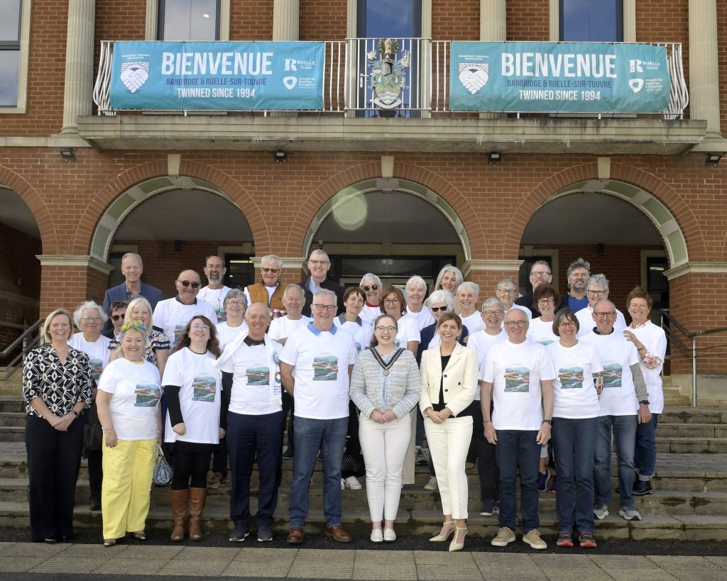 Large group of people standing on the steps of Banbridge Civic Building