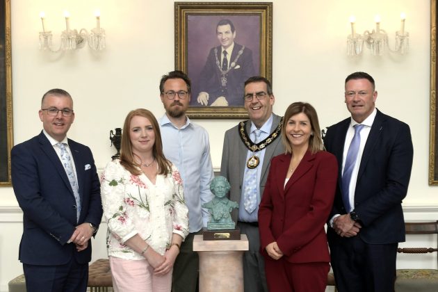 Lord Mayor Alderman Stephen Moutray welcomes renowned figurative sculptor Jethro Crabb to The Palace, Armagh, for the unveiling of a maquette (small-scale model) of the bronze portrait bust to honour Her Late Majesty Queen Elizabeth II. Also pictured are Alderman Paul Berry, Chair of the Governance, Resources and Strategy Committee Councillor Kate Evans; Interim Chief Executive Charlene Stoops; and Councillor Keith Ratcliffe.