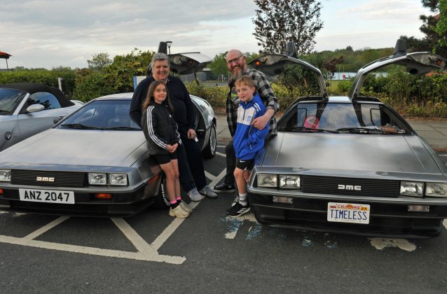 Delorean owners, David Mathers with grandaughter Gracie and Stephen Armstrong, Timeless Delorean and son Zack who displayed their cars at Craigavon Civic Centre.