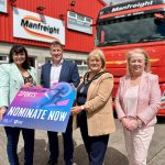 Nominate your rising stars for the ABC Junior Sports Awards 4 people standing in front of a Manfreight Ltd lorry holding a banner promoting the junior sports awards.