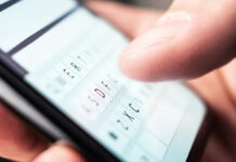Beware of Car Park Text Scam Person texting