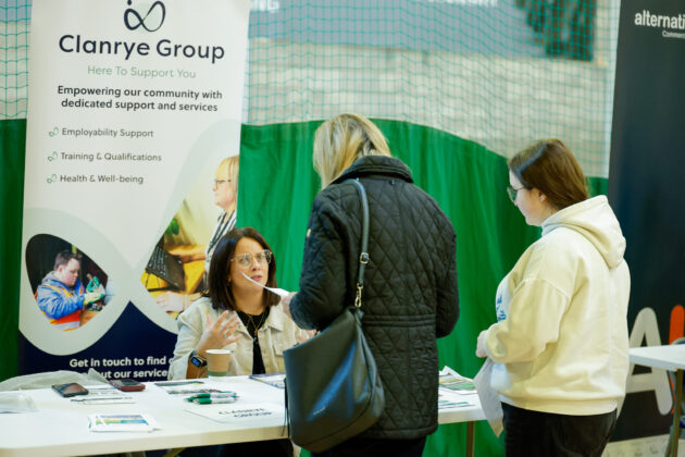 People talking at a job fair