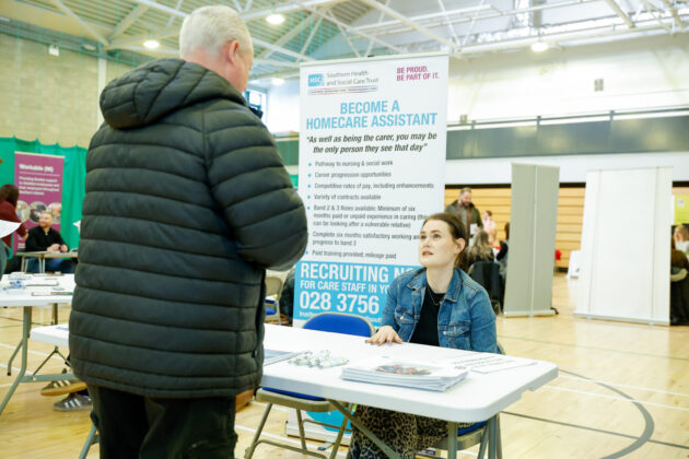 People talking at a job fair