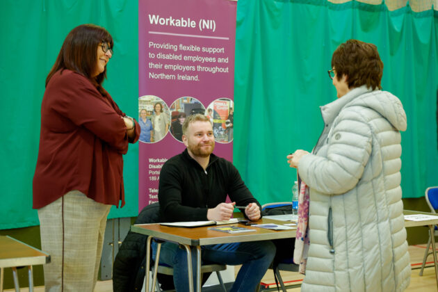 People talking at a job fair