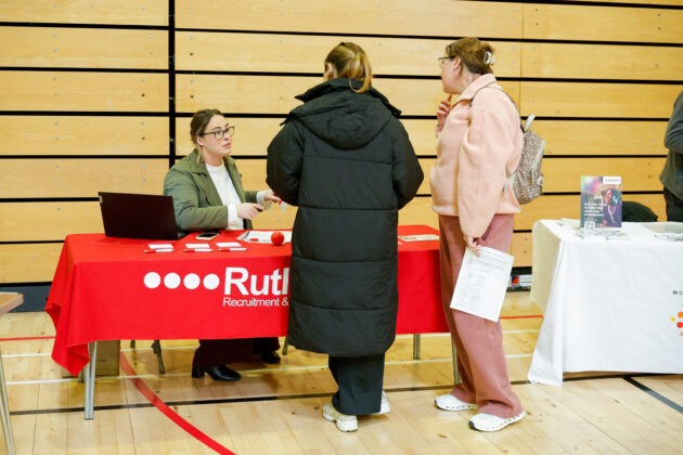 People talking at a job fair