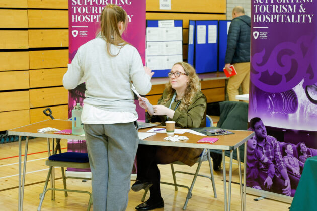 People talking at a job fair
