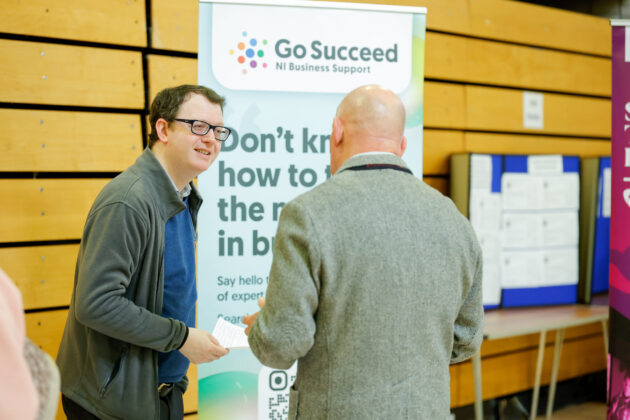 People talking at a job fair