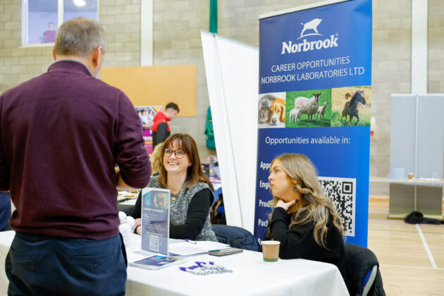 People talking at a job fair