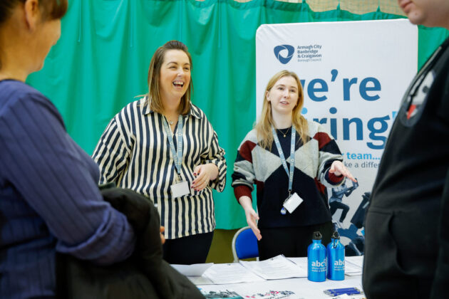 People talking at a job fair