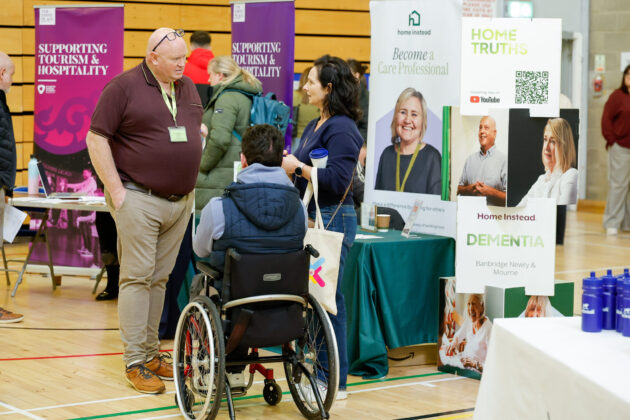 People talking at a job fair