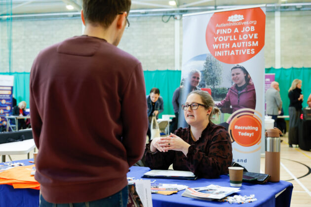 People talking at a job fair