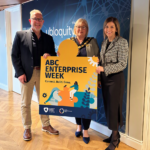 Enterprise Week 2026 set to inspire local businesses through stories, skills and fresh perspectives Three people holding a sign that says ABC Enterprise Week