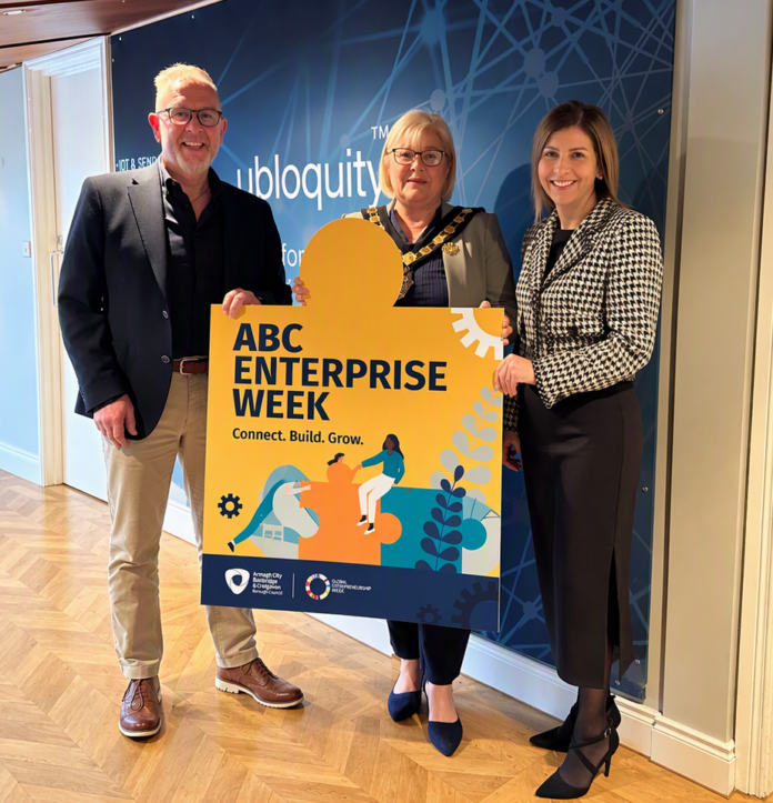 ABC Enterprise Week 2026 2 Three people holding a sign that says ABC Enterprise Week